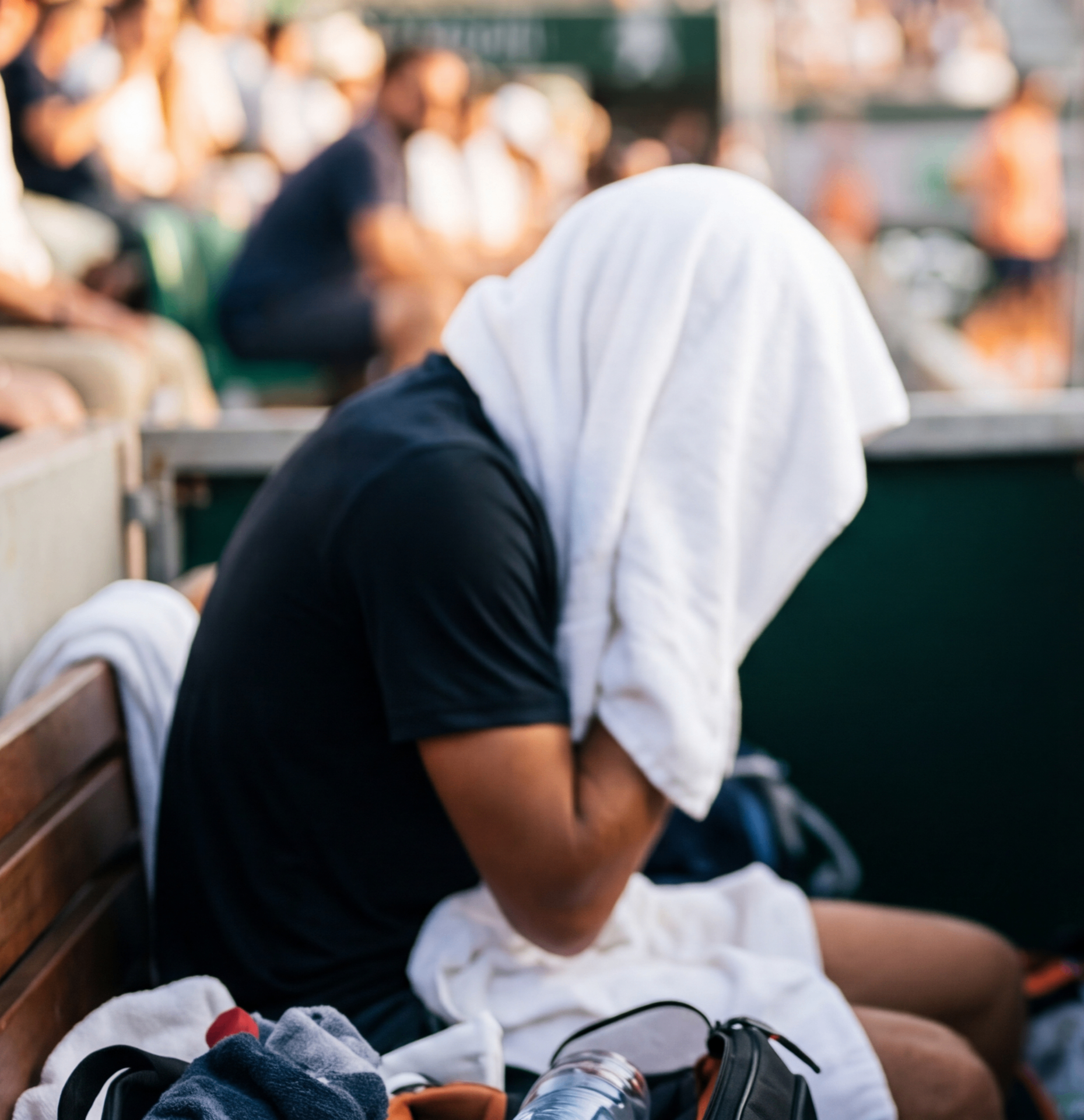 Coach speaking with player